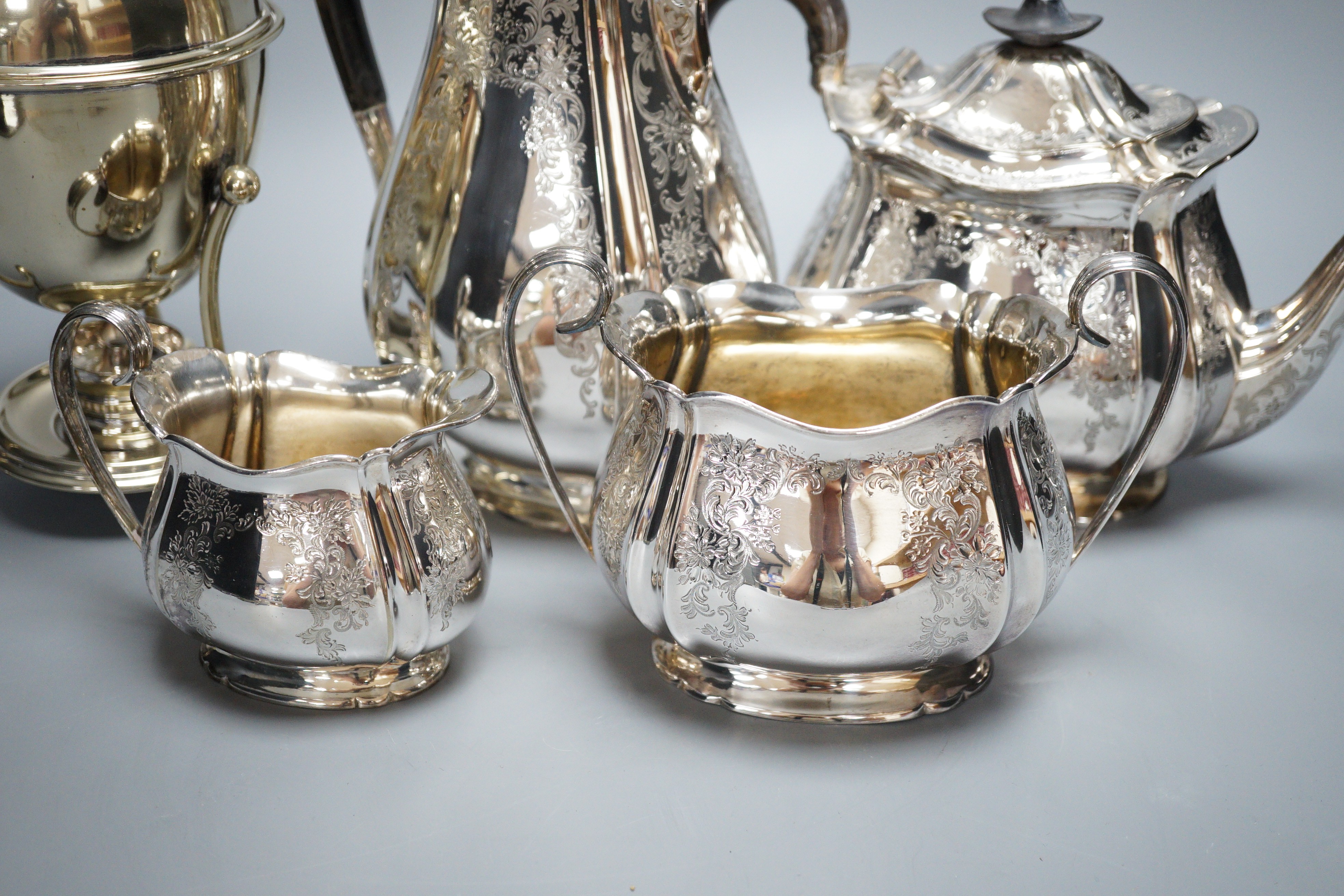 A canteen of silver plated cutlery, a four piece plated tea set and a plated egg coddler.